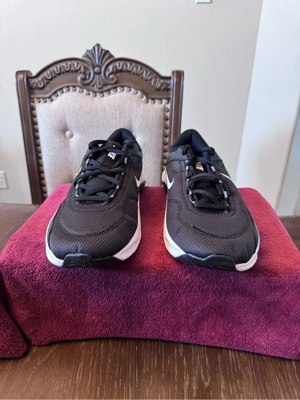 11 Men’s Nike Black Running Sneakers with White Swoosh